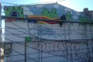 El raper El Disop pinta el mural independentista de Cassà