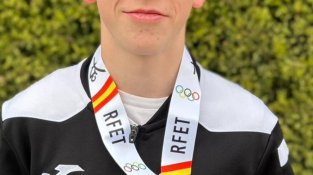 Andreas, amb la medalla de campió