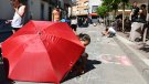 El dibuix sobre l'asfalt obre els actes del diumenge de la Festa